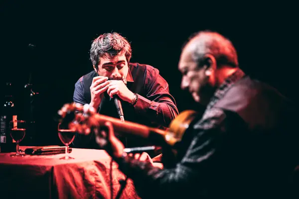 1ère partie : Rudi Flores et Franco Luciani | 2nde partie : Melingo